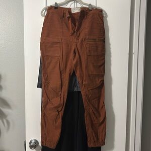 REI Co-op burnt orange joggers 8